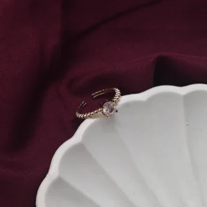 dhaneira’s gold tone ring
